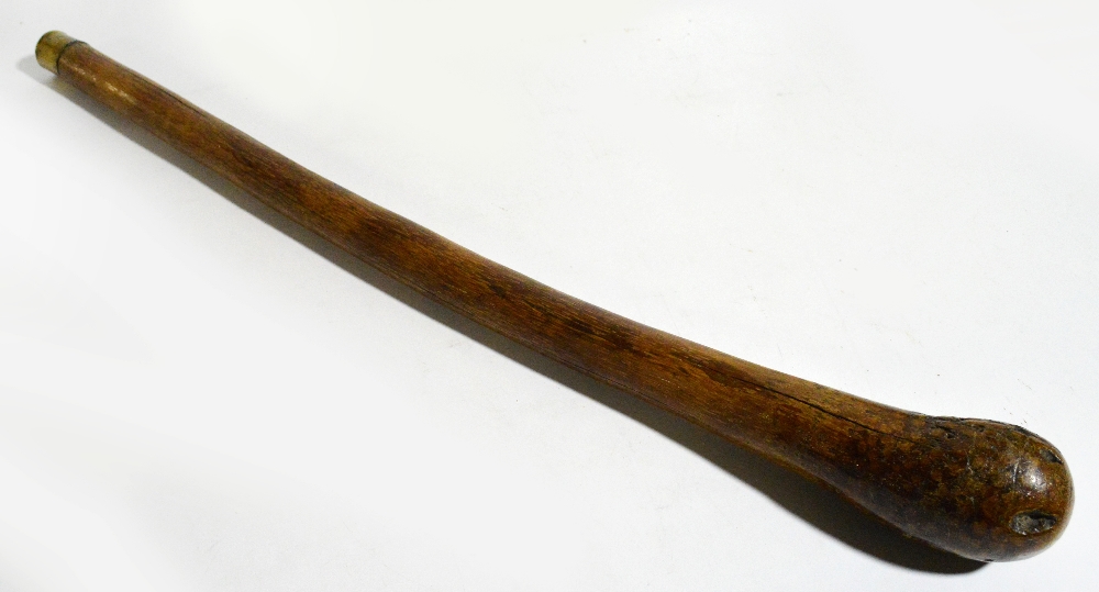 An early 20th century seal cudgel with brass ferrule, length 96.5cm.