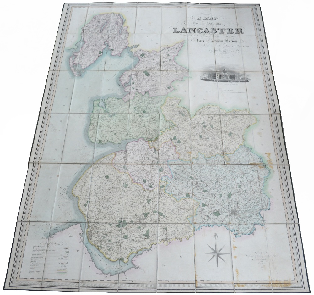 A large 19th century coloured engraved folding map of Lancaster by G Hennet of London, published
