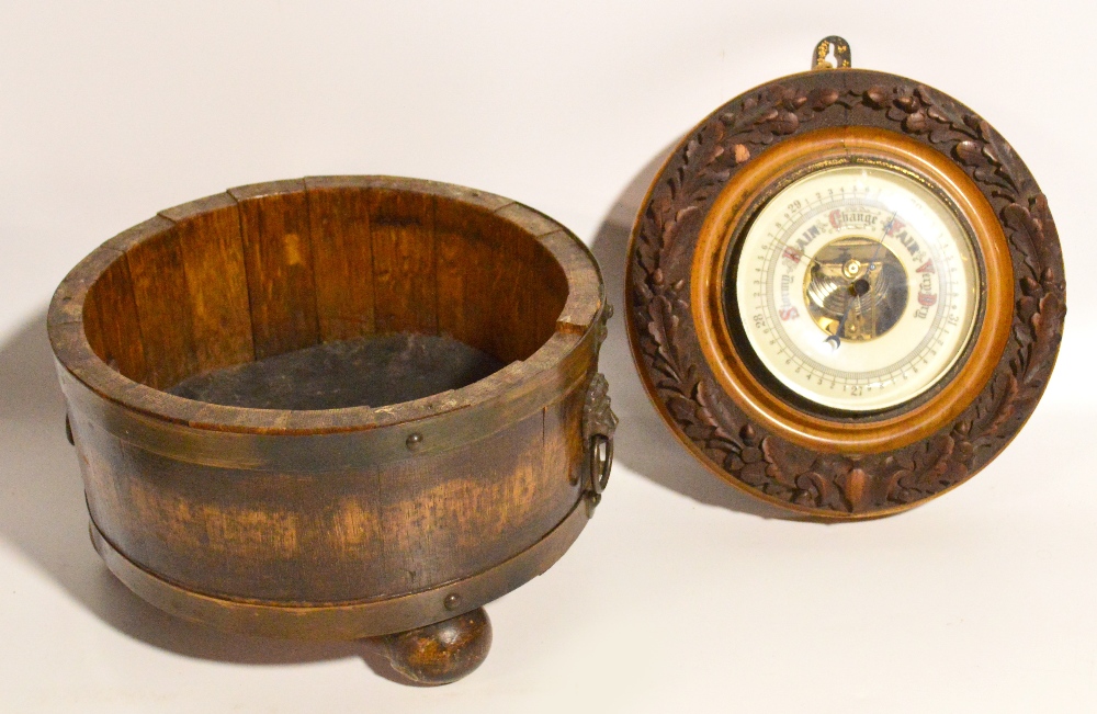 MACCLESFIELD SCHOOL OF CARVING; circular wall barometer carved with oak leaves and acorns,