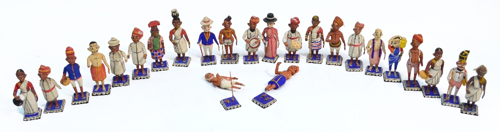 Twenty-four early 20th century Sinhalese carved wooden and painted figures, each on square section