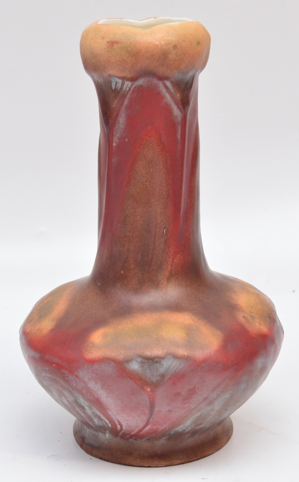 An Ernst Wahliss Art Nouveau vase decorated with moulded stylised flowerheads, scratched initial