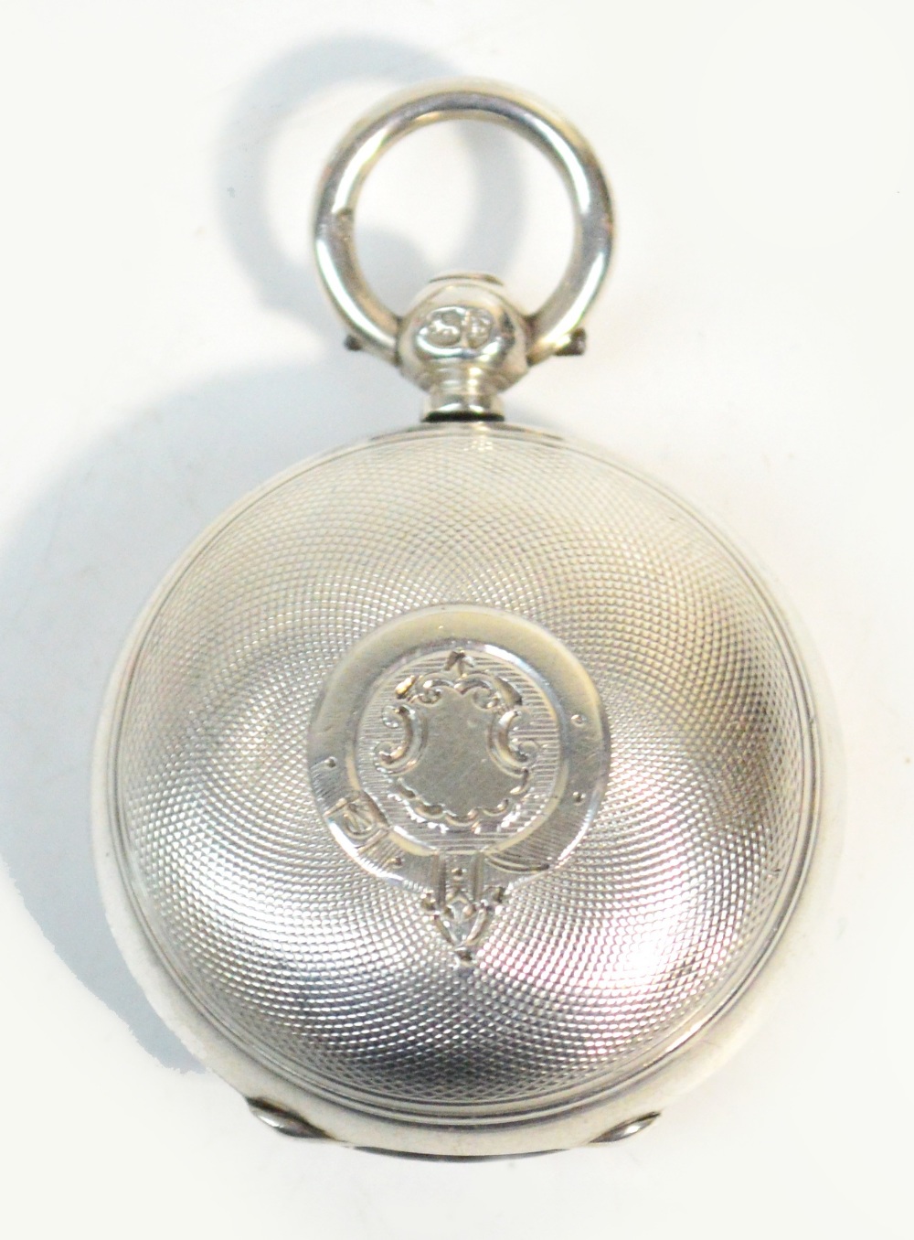 A Victorian hallmarked silver sovereign case with engine turned decoration and vacant shield