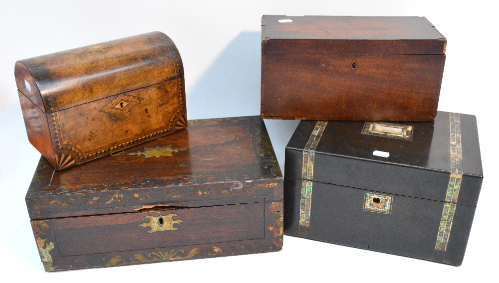 A Victorian walnut and inlaid dome topped tea caddy, the hinged lid enclosing two lidded