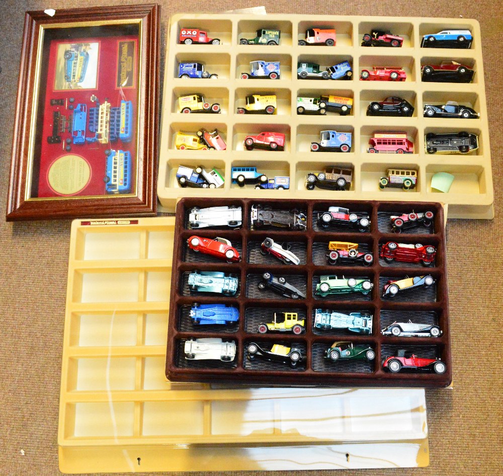A Matchbox limited edition Leyland Titan TD1 in glazed display case, also two display units