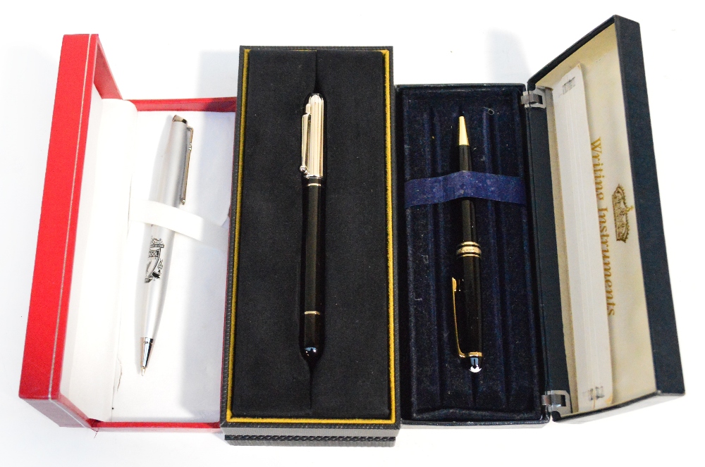 A modern boxed Dunhill ballpoint pen, a boxed Mont Blanc ballpoint pen, and a boxed Liverpool