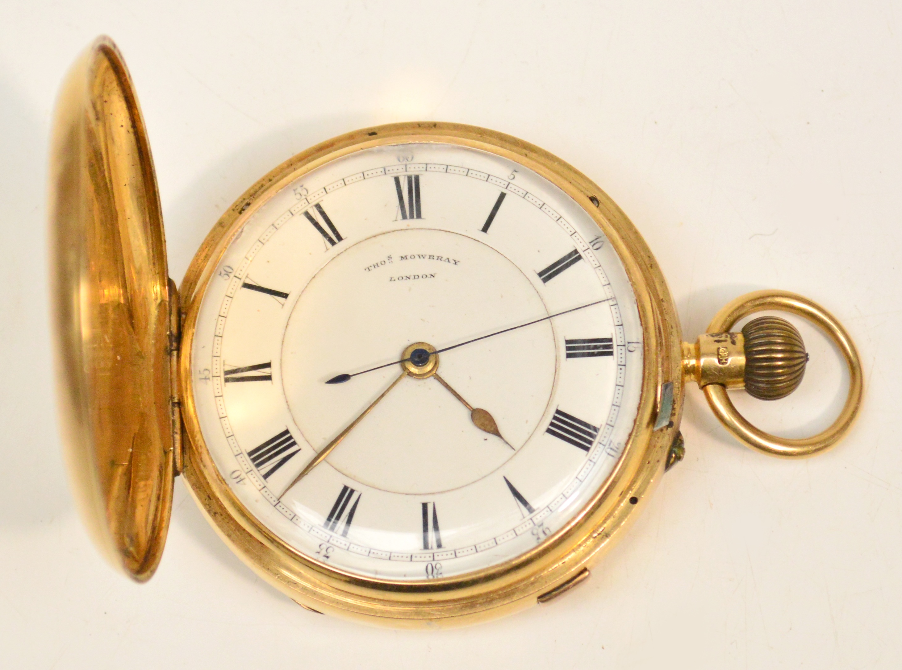 An 18ct gold full hunter chronograph pocket watch, the circular white enamel dial set with Roman