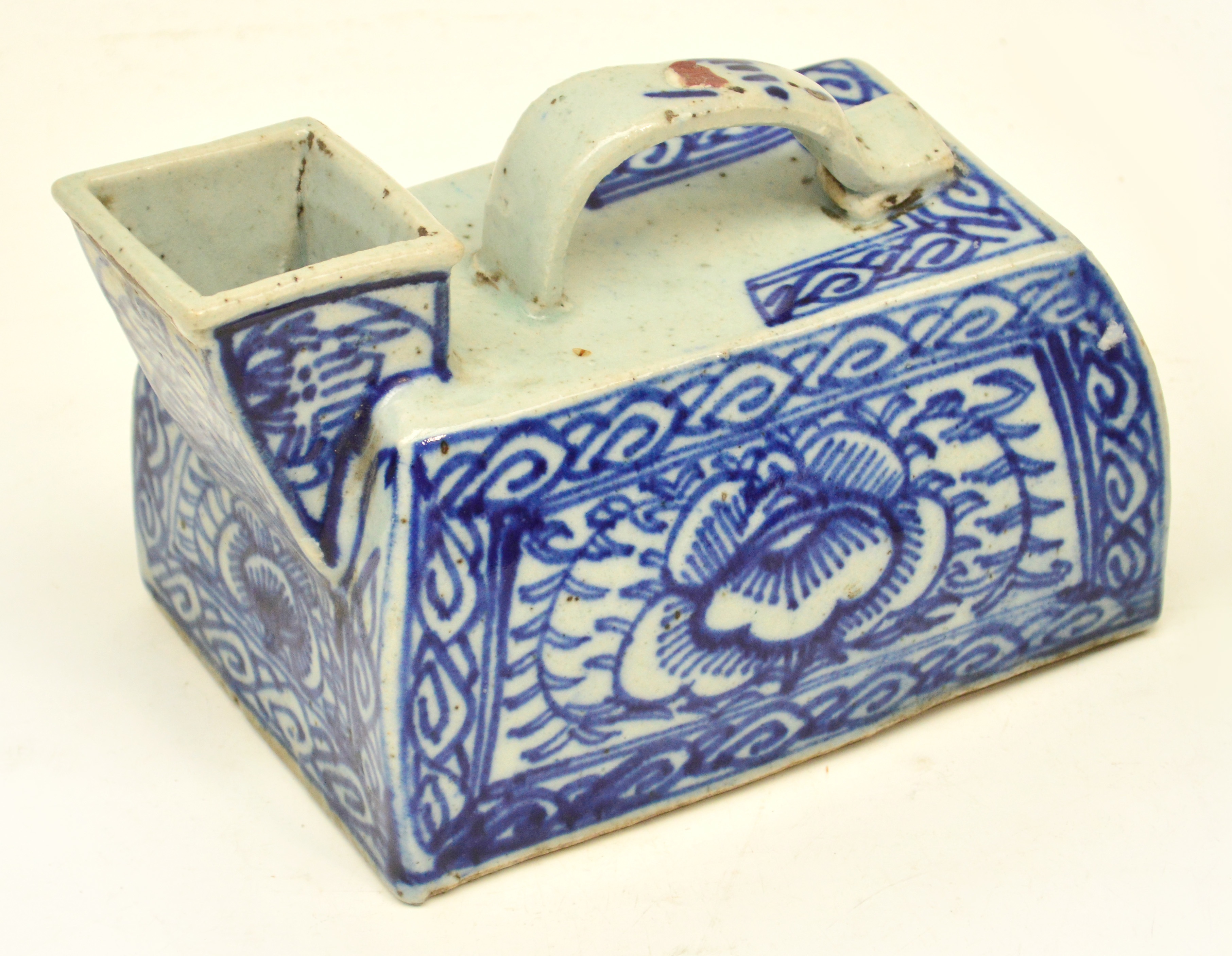 A 19th century Chinese blue and white decorated bordaloo, with traces of red export seal, length