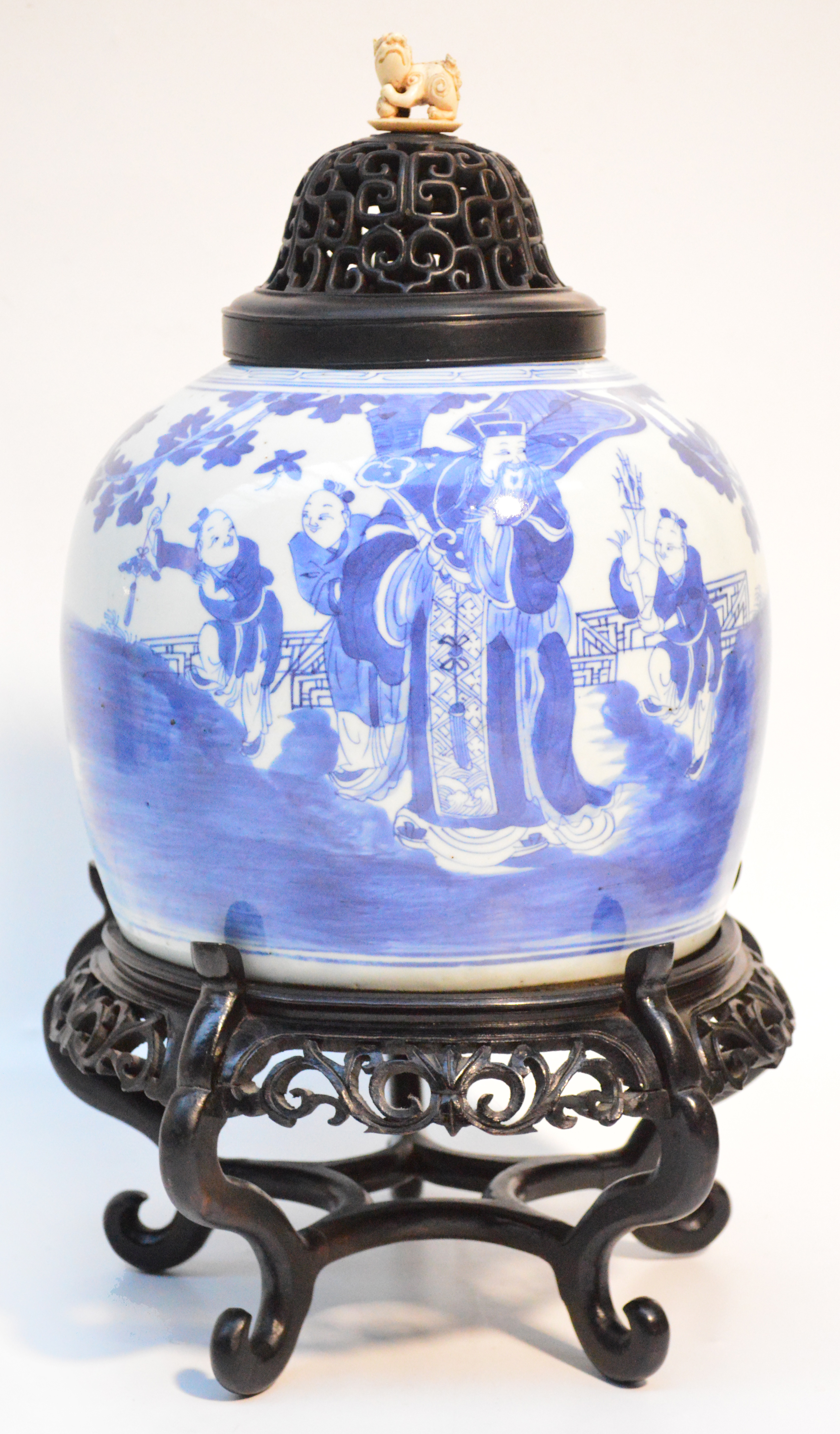 A 19th century Chinese porcelain vase painted in underglaze blue with a scholar beneath a tree
