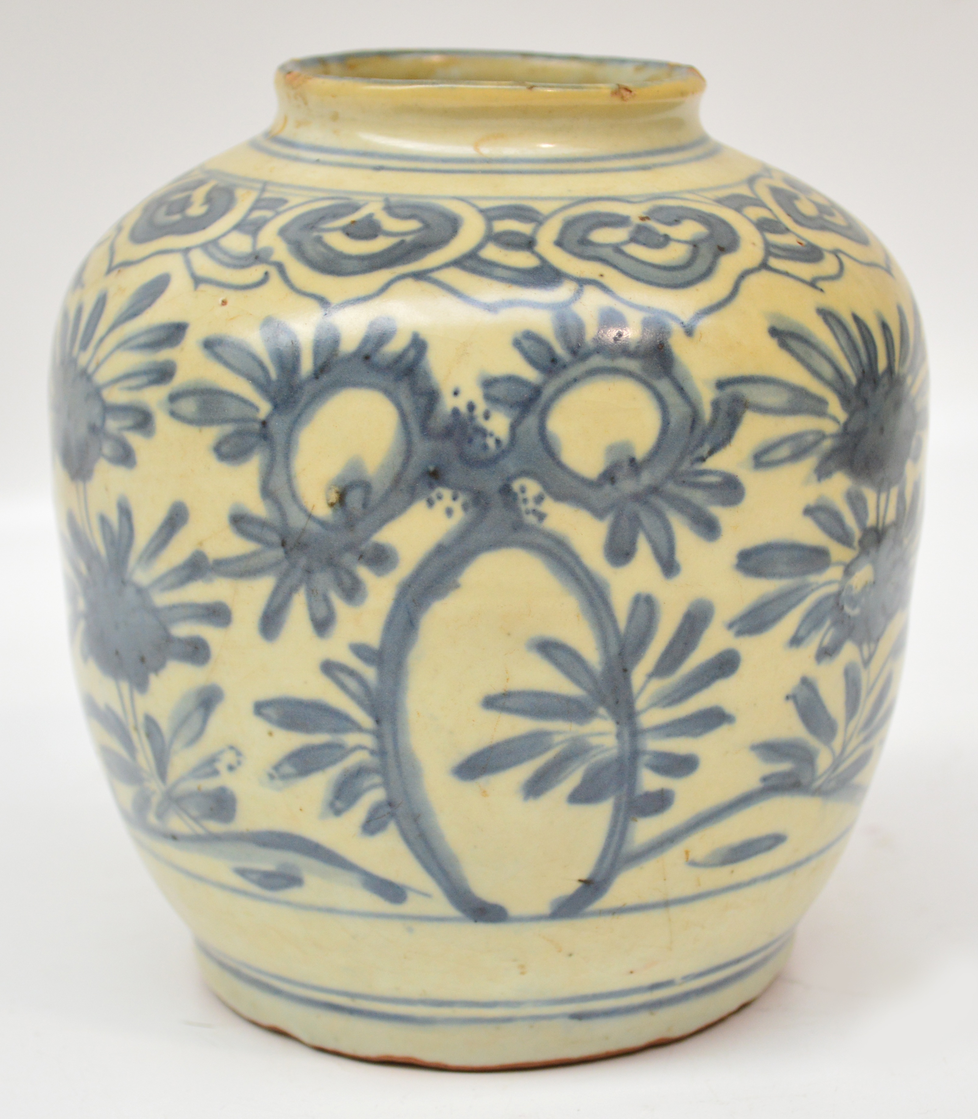 A 16th century Chinese porcelain jar painted in underglaze blue with chrysanthemum sprays, height