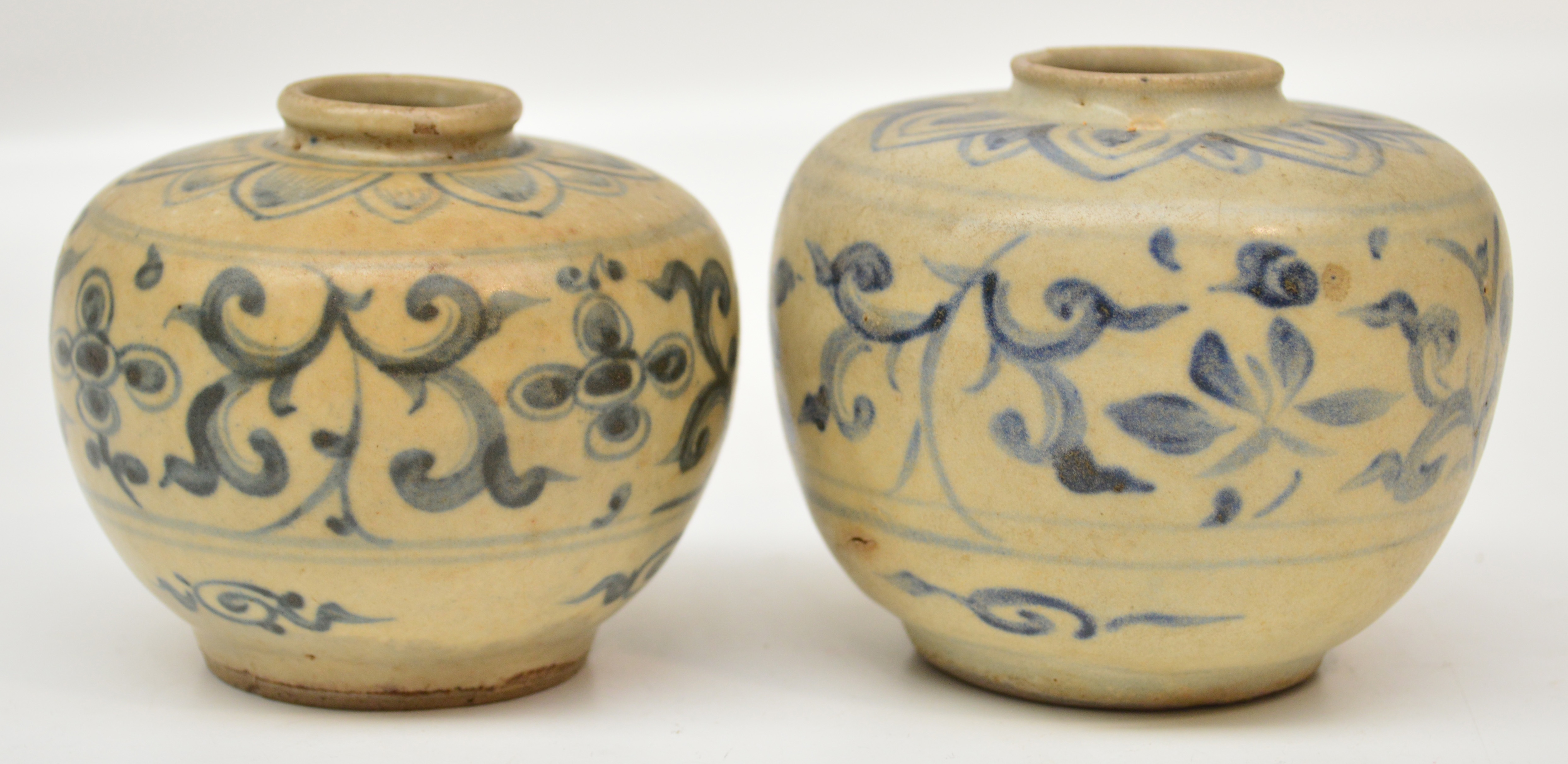 Two 15th century Anamese jars excavated from the Hoi An shipwreck, both painted in underglaze blue