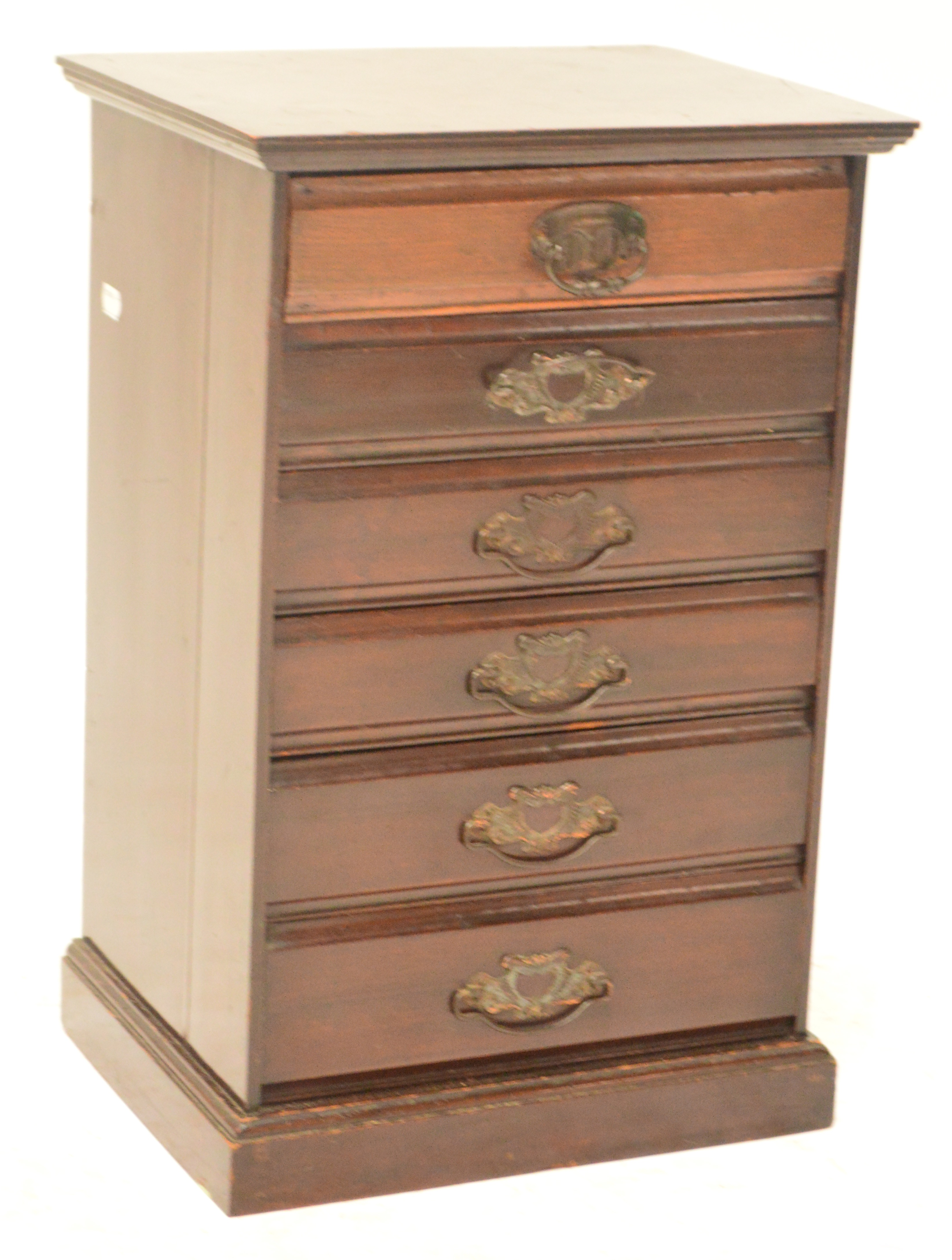 A miniature chest of six drawers raised on a plinth base, width 36.5cm.