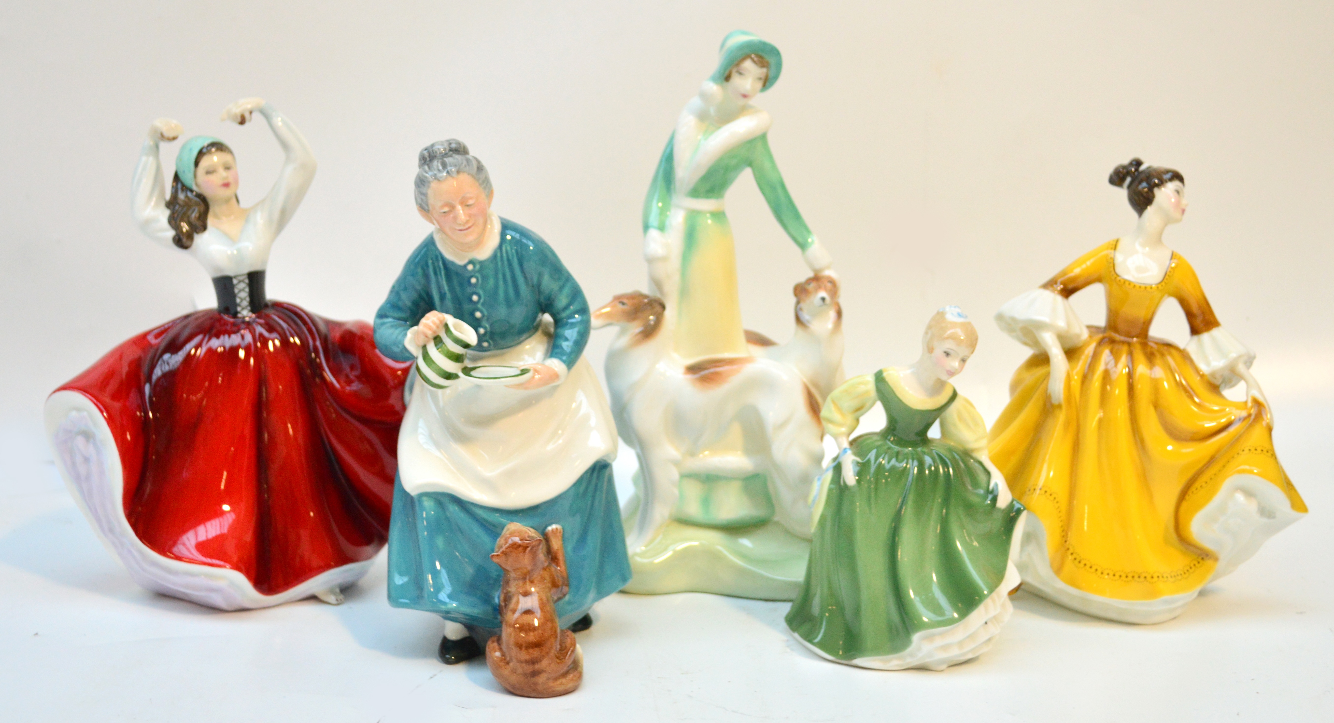 Five Royal Doulton figurines HN2807 "Stephanie" (reject), HN2388 "Karen" (second), HN2211 "Fair