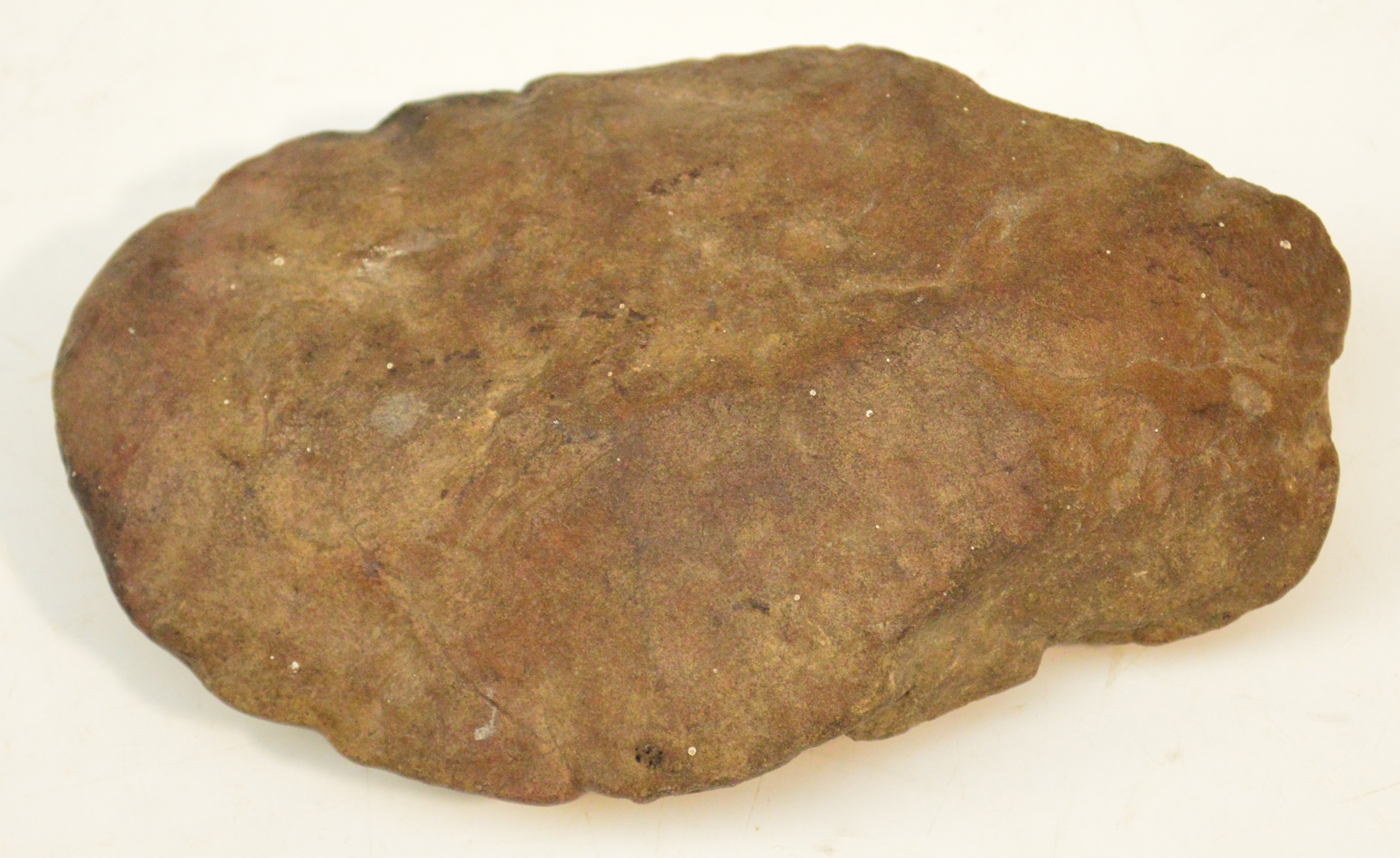 A Neolithic hand axe, length 14.5cm. It was found during the excavation of the reservoir behind