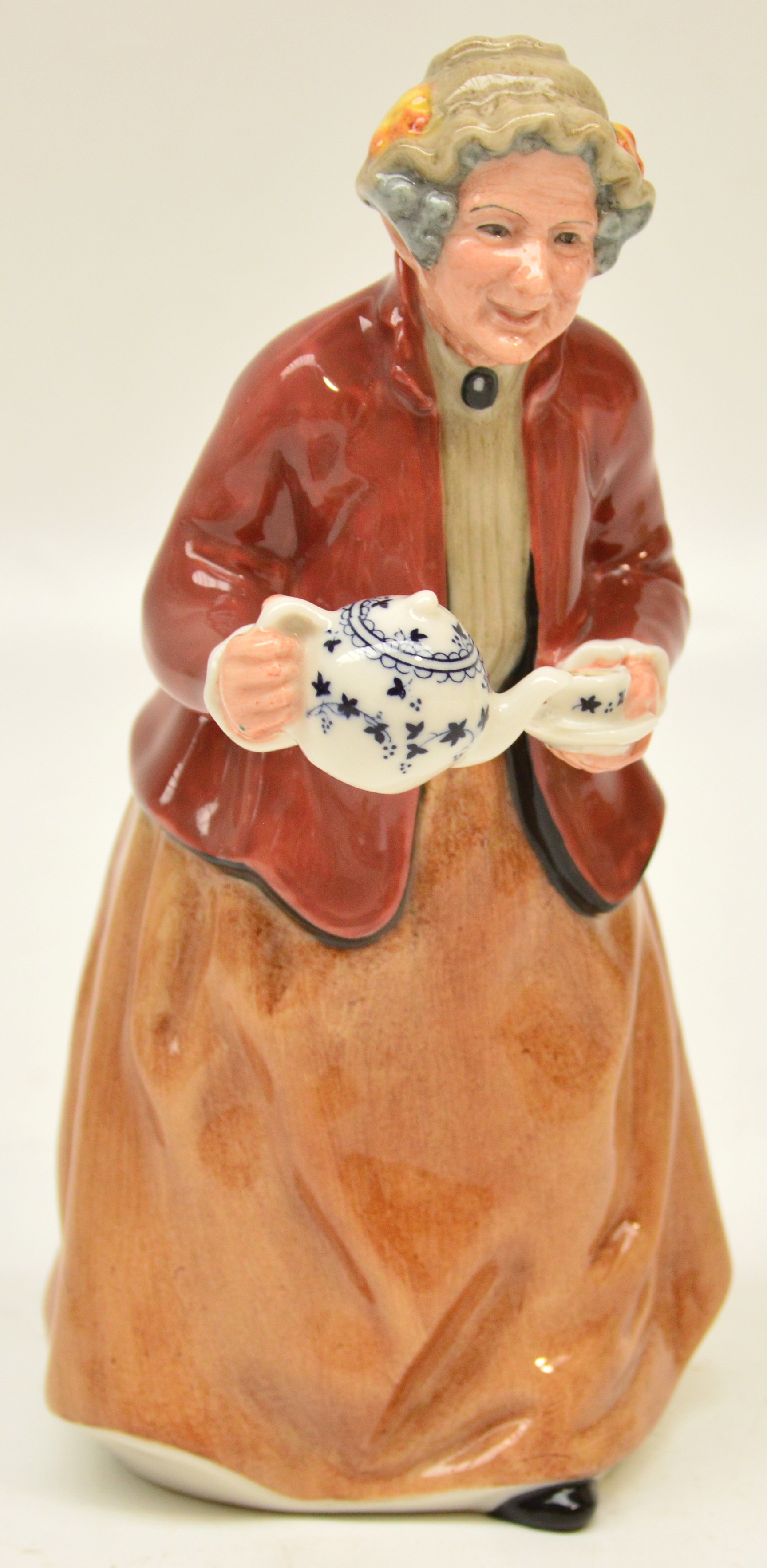 A Royal Doulton figurine HN2255 "Teatime". CONDITION REPORT: Appears good with no obvious signs of