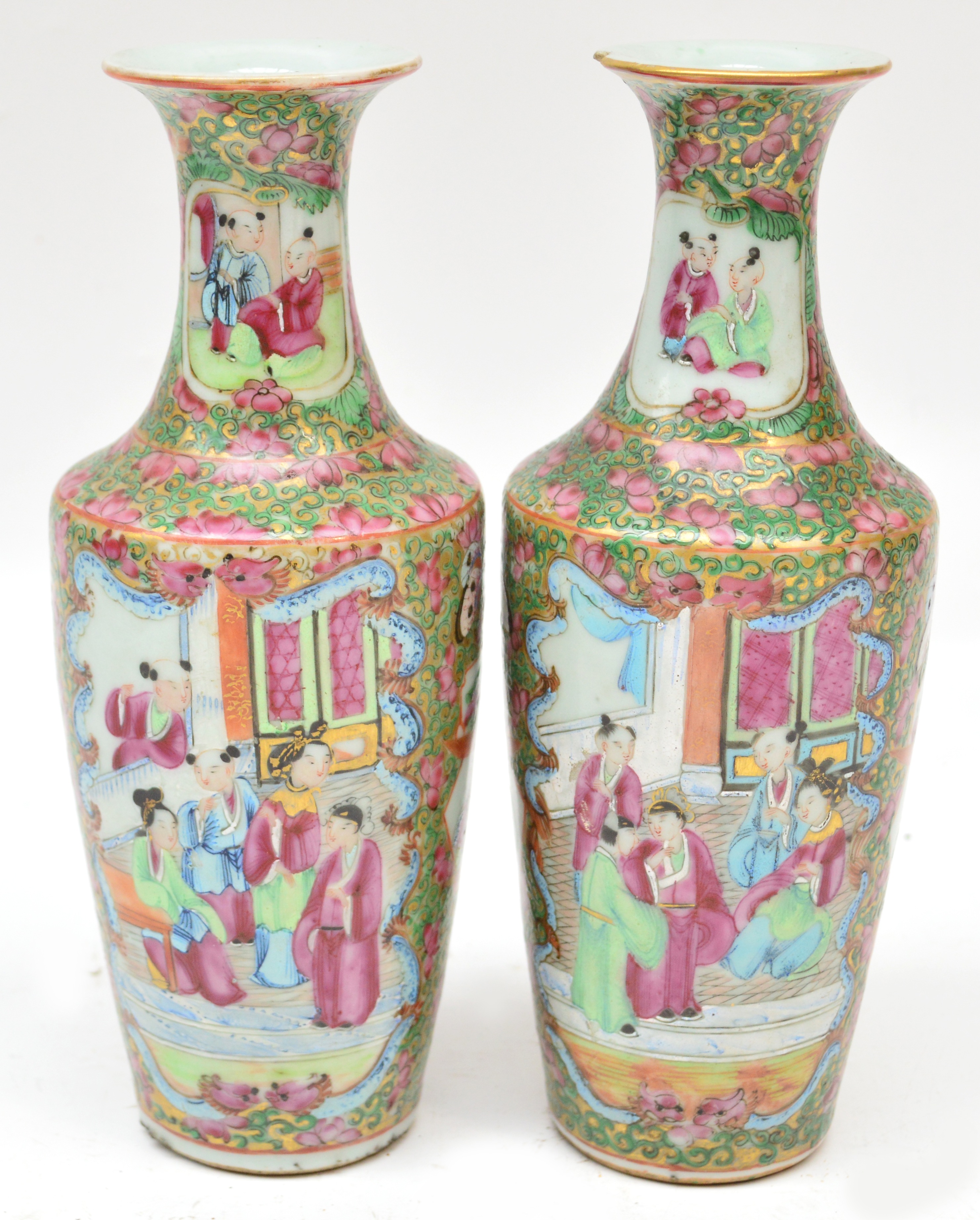 A pair of 19th century Chinese Canton porcelain baluster vases with slender necks and flared rim,