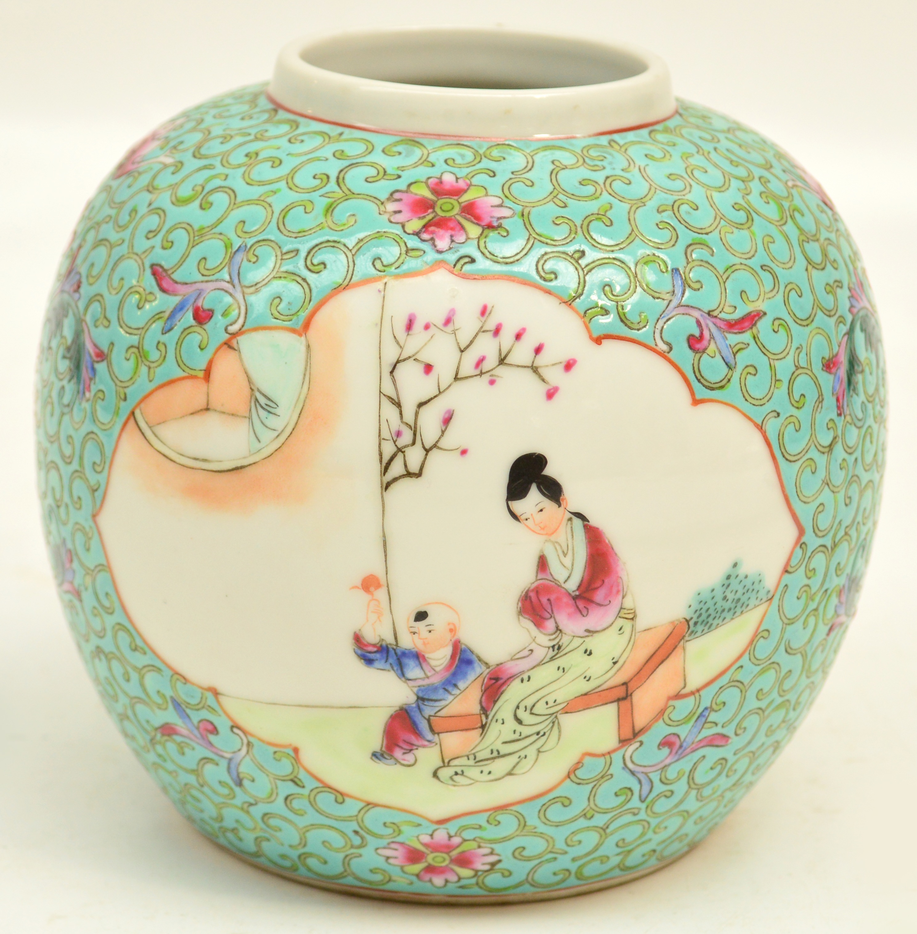 An early 20th century Chinese porcelain jar painted in Famille Rose enamels with two shaped panels