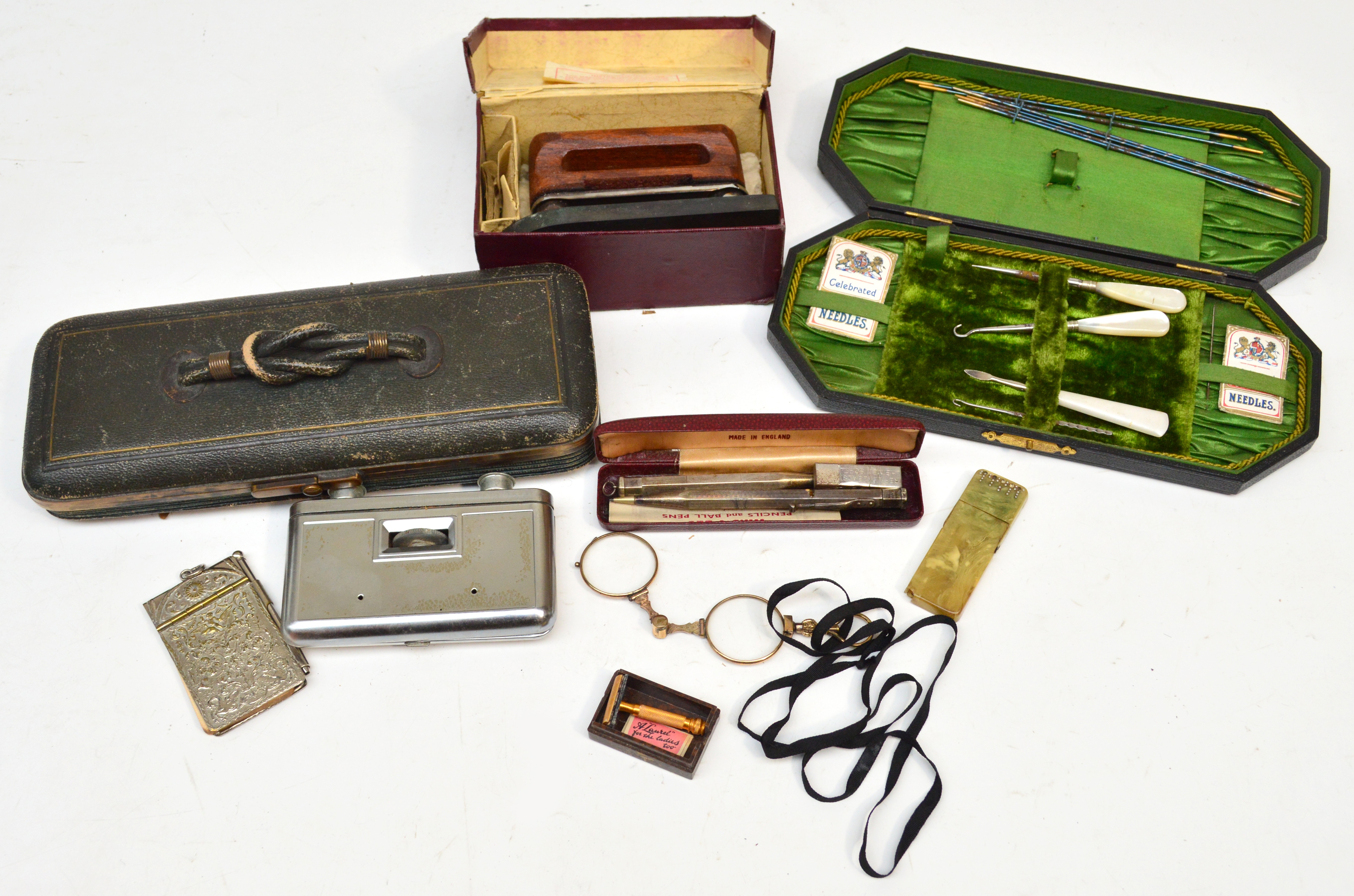 A mixed lot of collectables including a glove box, Yard-O-Led silver pencil, lorgnettes,