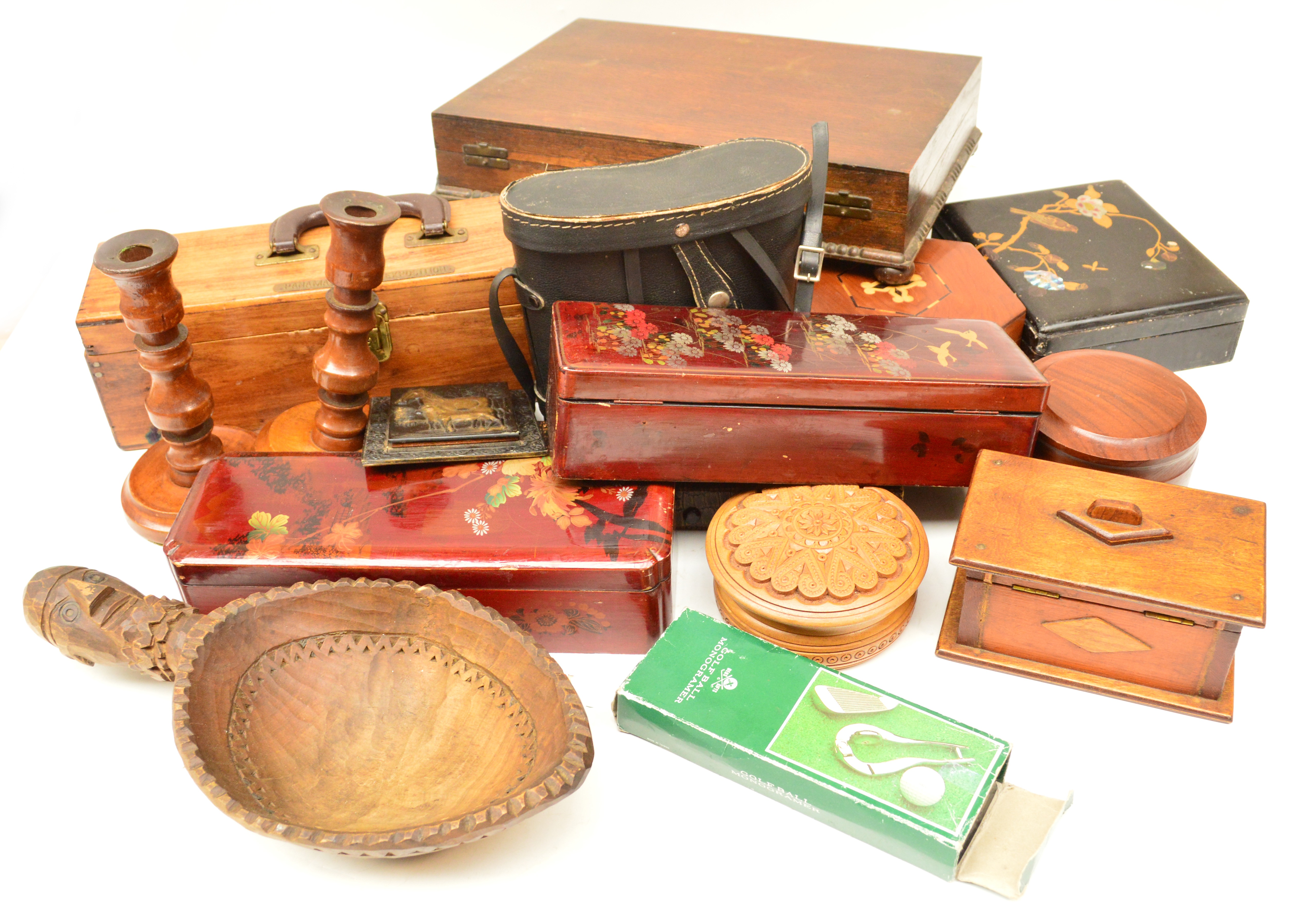 A mixed lot of collectables including a tribal bowl, pair of treen candlesticks, cased pair of