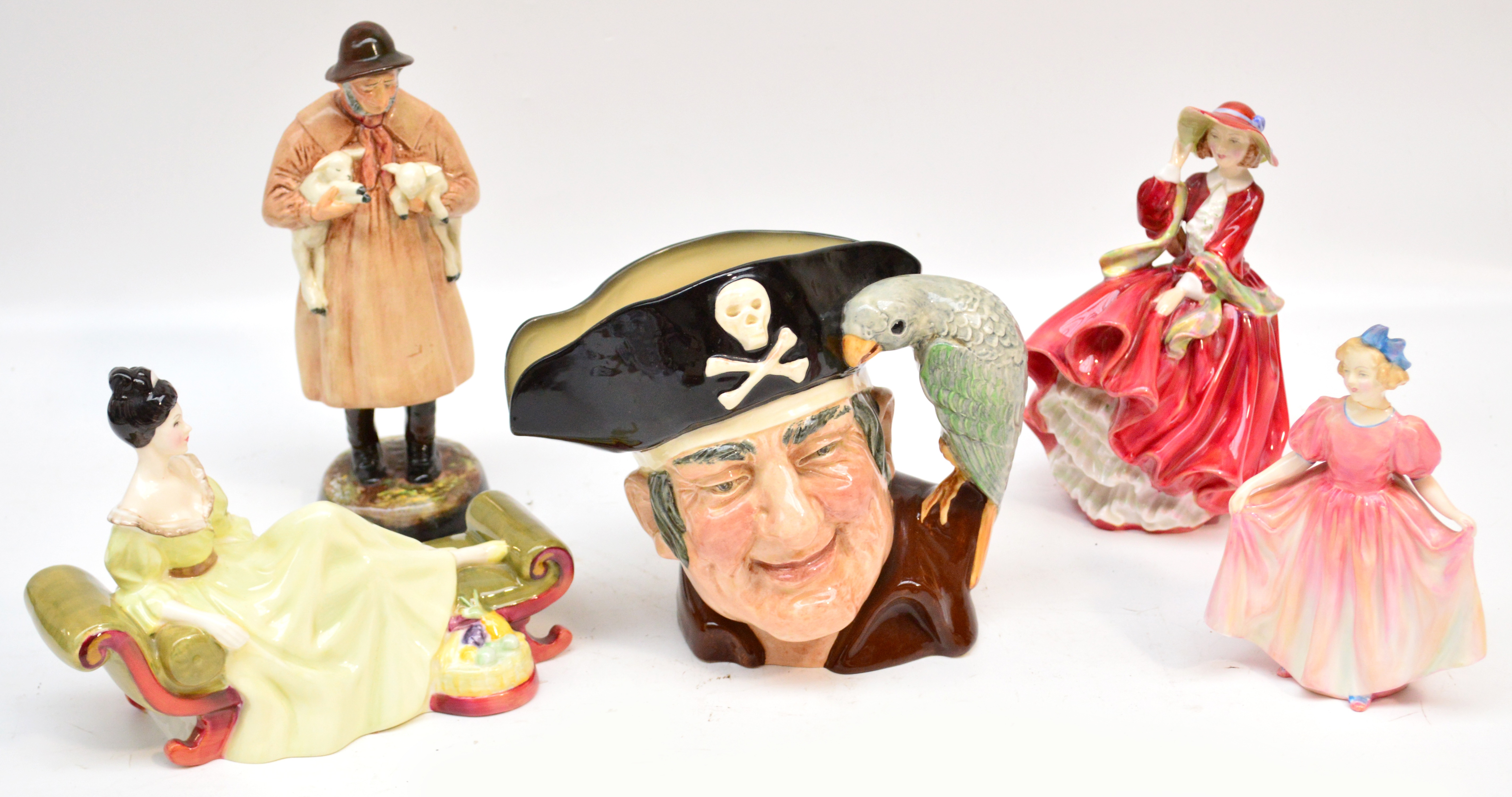 A Royal Doulton character jug D6335 "Long John Silver ", with four assorted Doulton figures (all