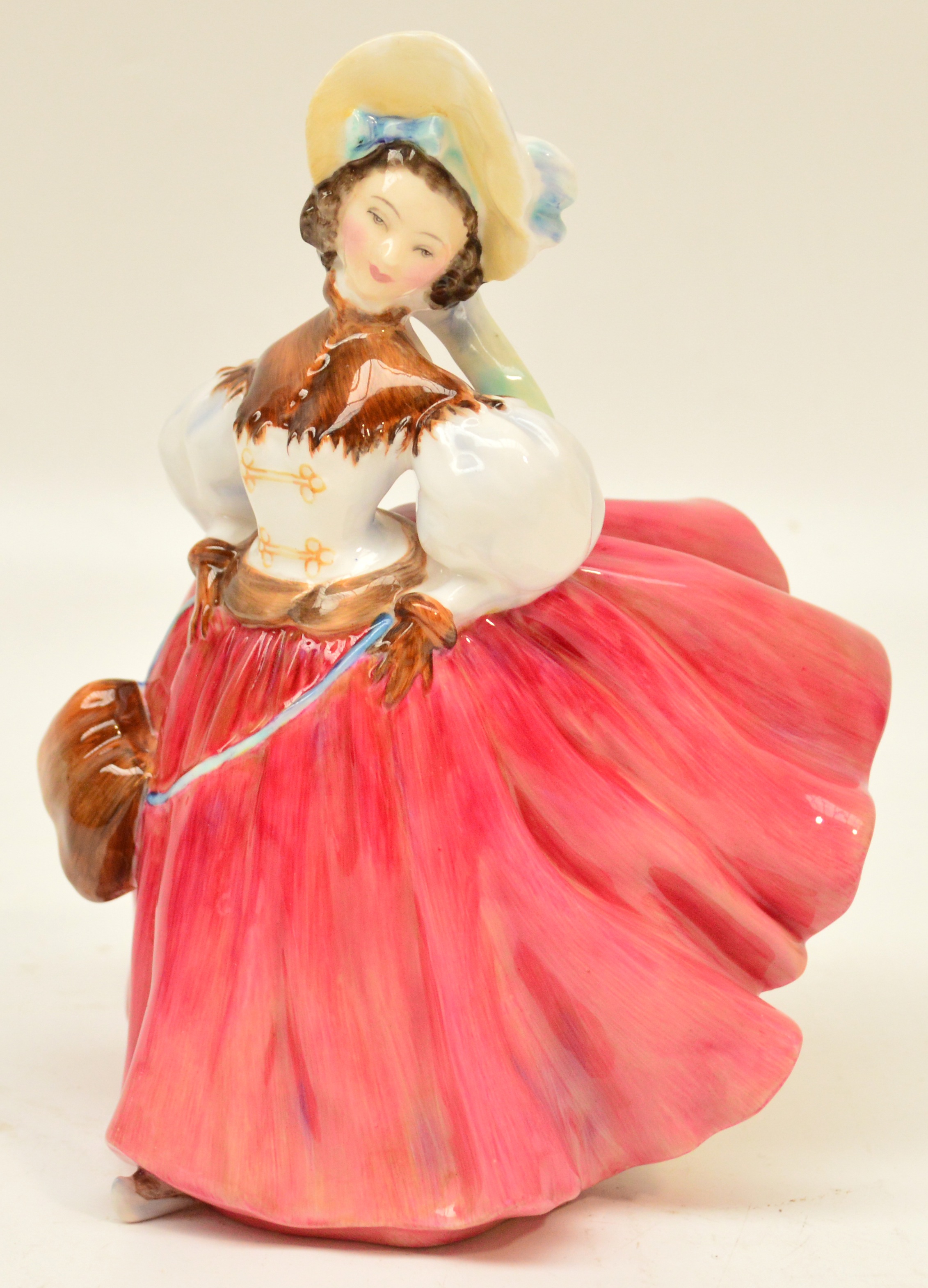 A Royal Doulton figurine HN2117 "The Skater". CONDITION REPORT: Appears good with no obvious signs