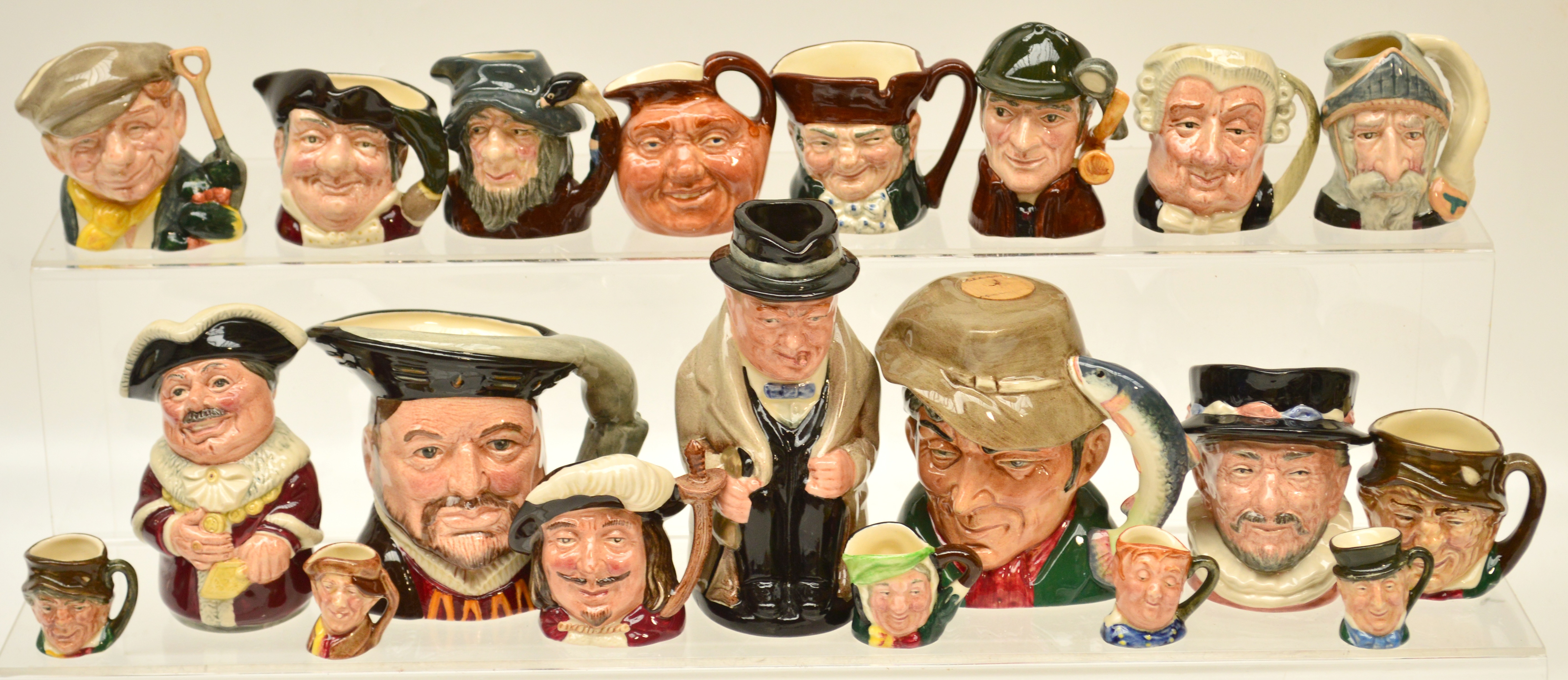 A collection of twenty Royal Doulton character jugs including five tiny examples, ten small