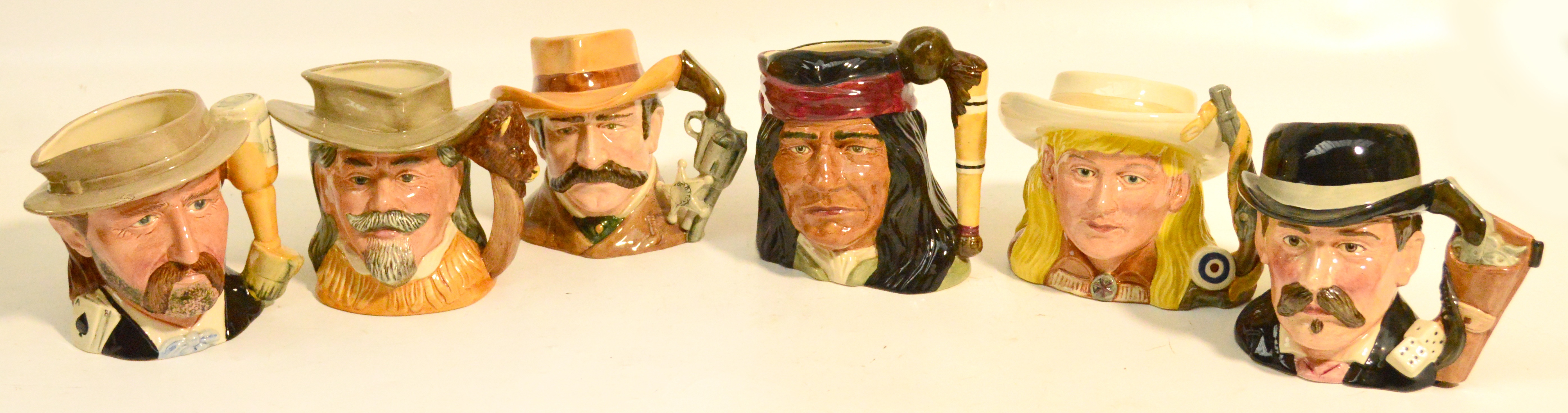 A set of six Royal Doulton "The Wild West" series character jugs D6735 "Buffalo Bill" (second),