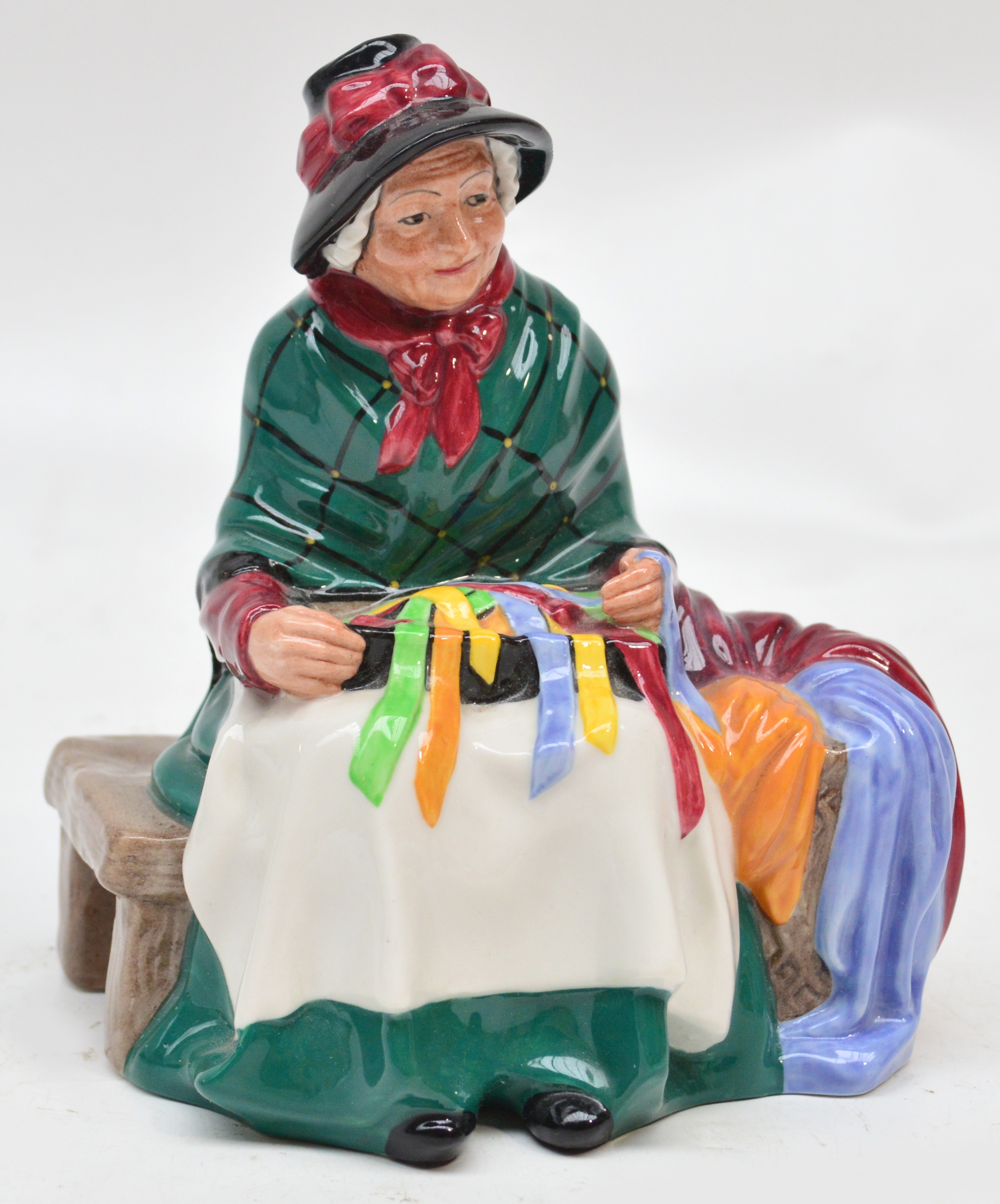 A Royal Doulton figurine HN2017 "Silks and Ribbons". CONDITION REPORT: Appears good with no