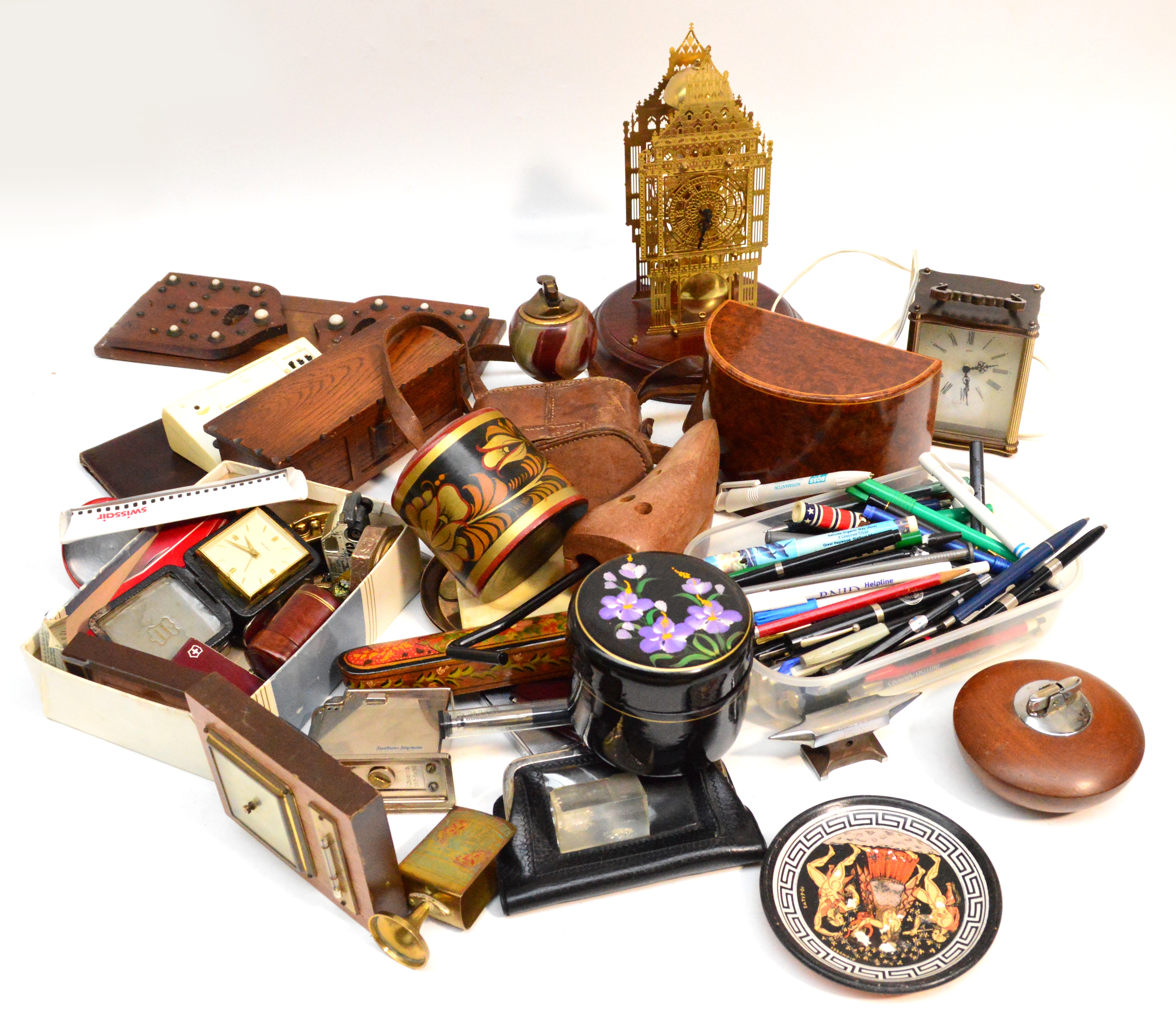 A mixed lot of collectors' items including a quantity of assorted lighters, pens, bookstand,