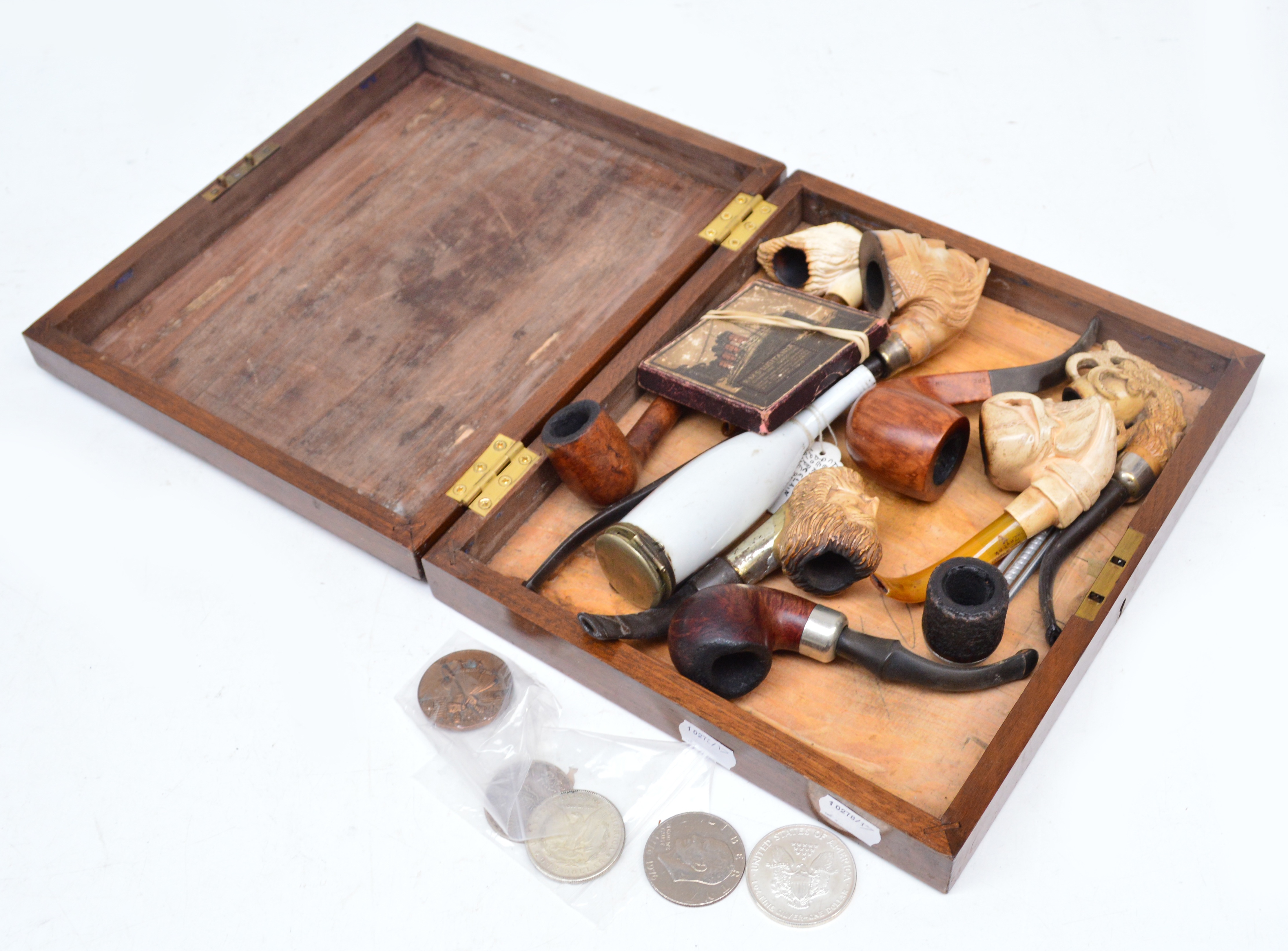 Five carved Meerschaum pipes, various other pipes and a small quantity of coins. CONDITION REPORT: