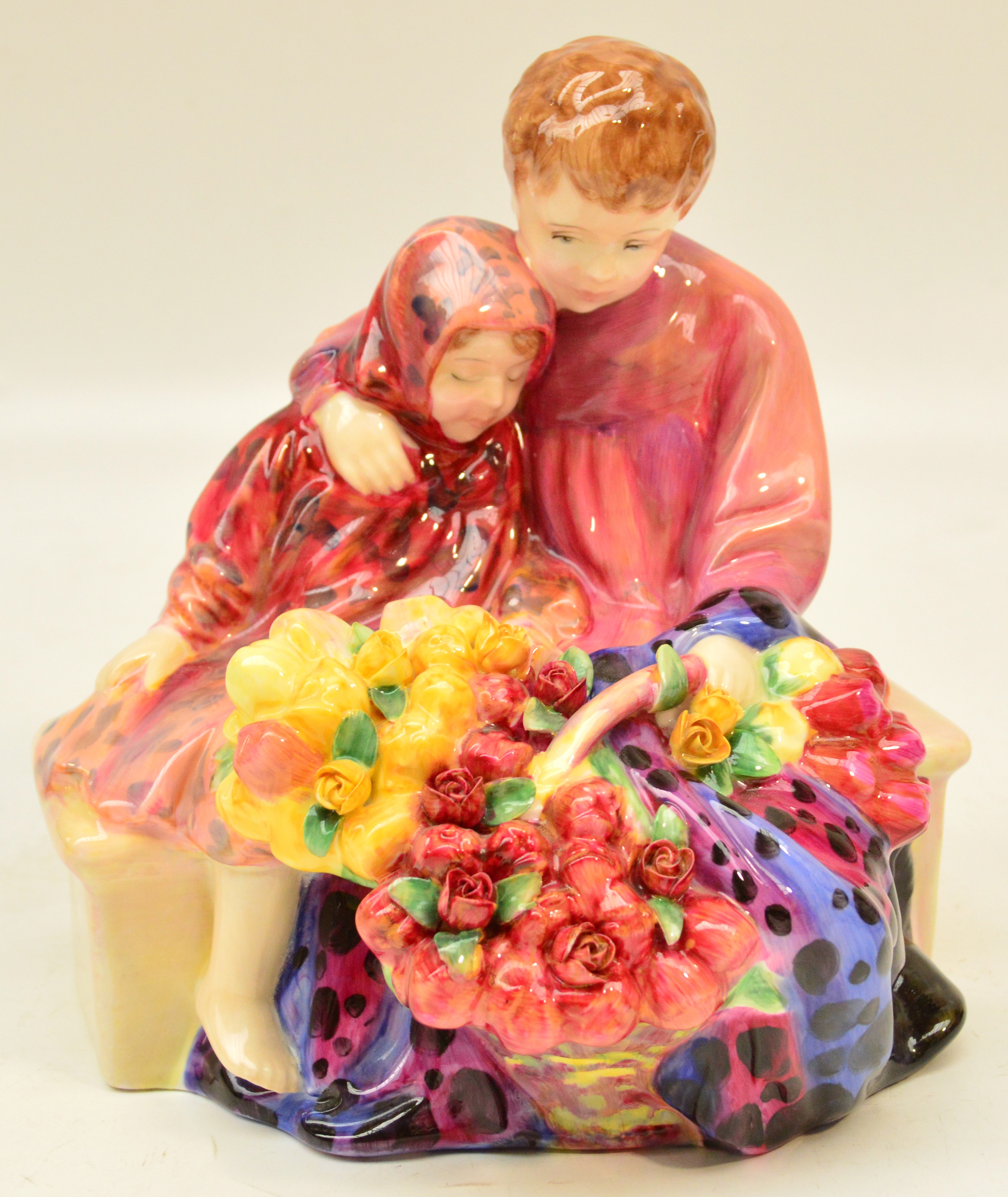 A Royal Doulton figurine HN1342 "Flower Sellers Children". CONDITION REPORT: Appears good with no