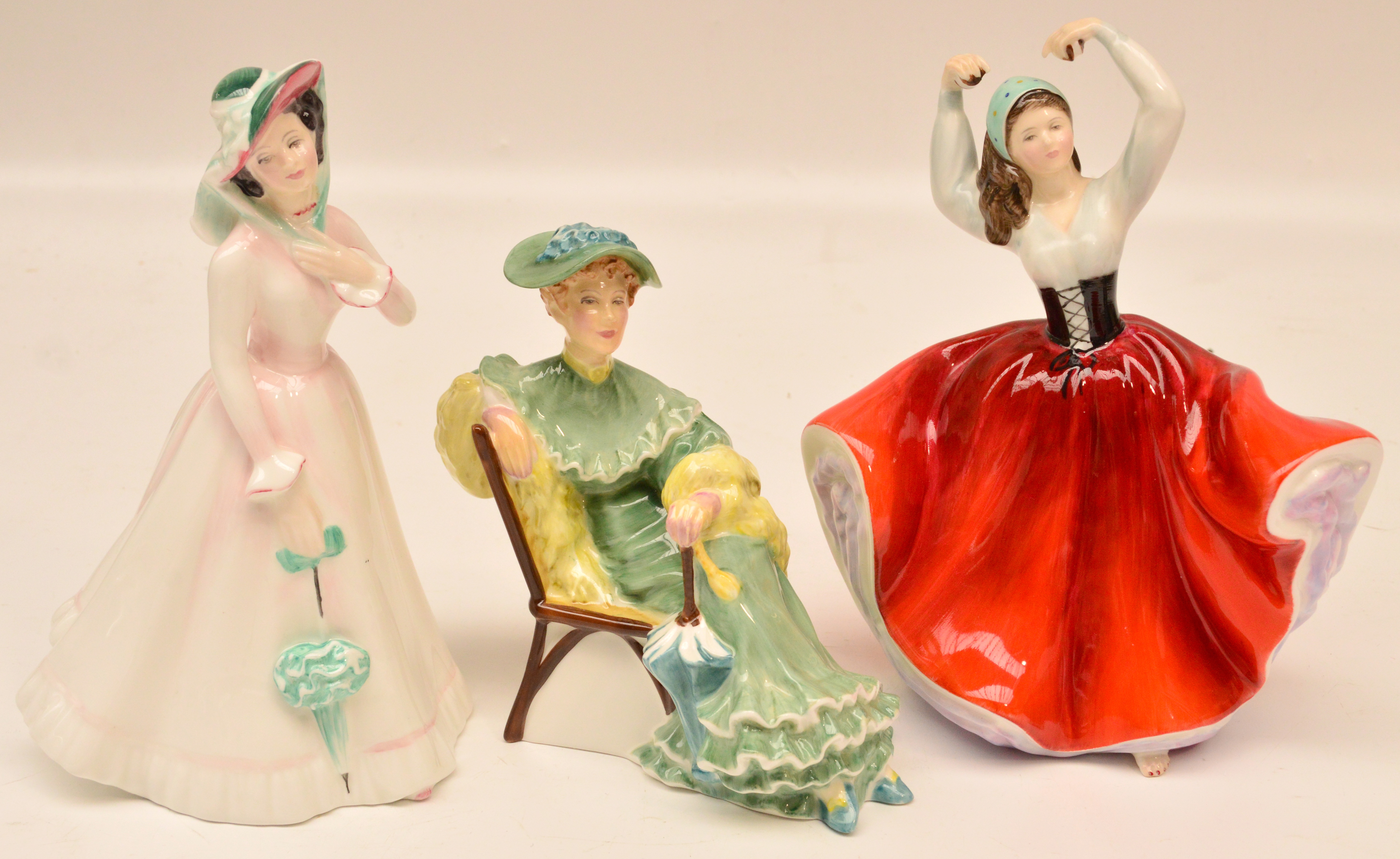 Three Royal Doulton figurines HN2706 "Julia", HN2388 "Karen" and HN2356 "Ascot"