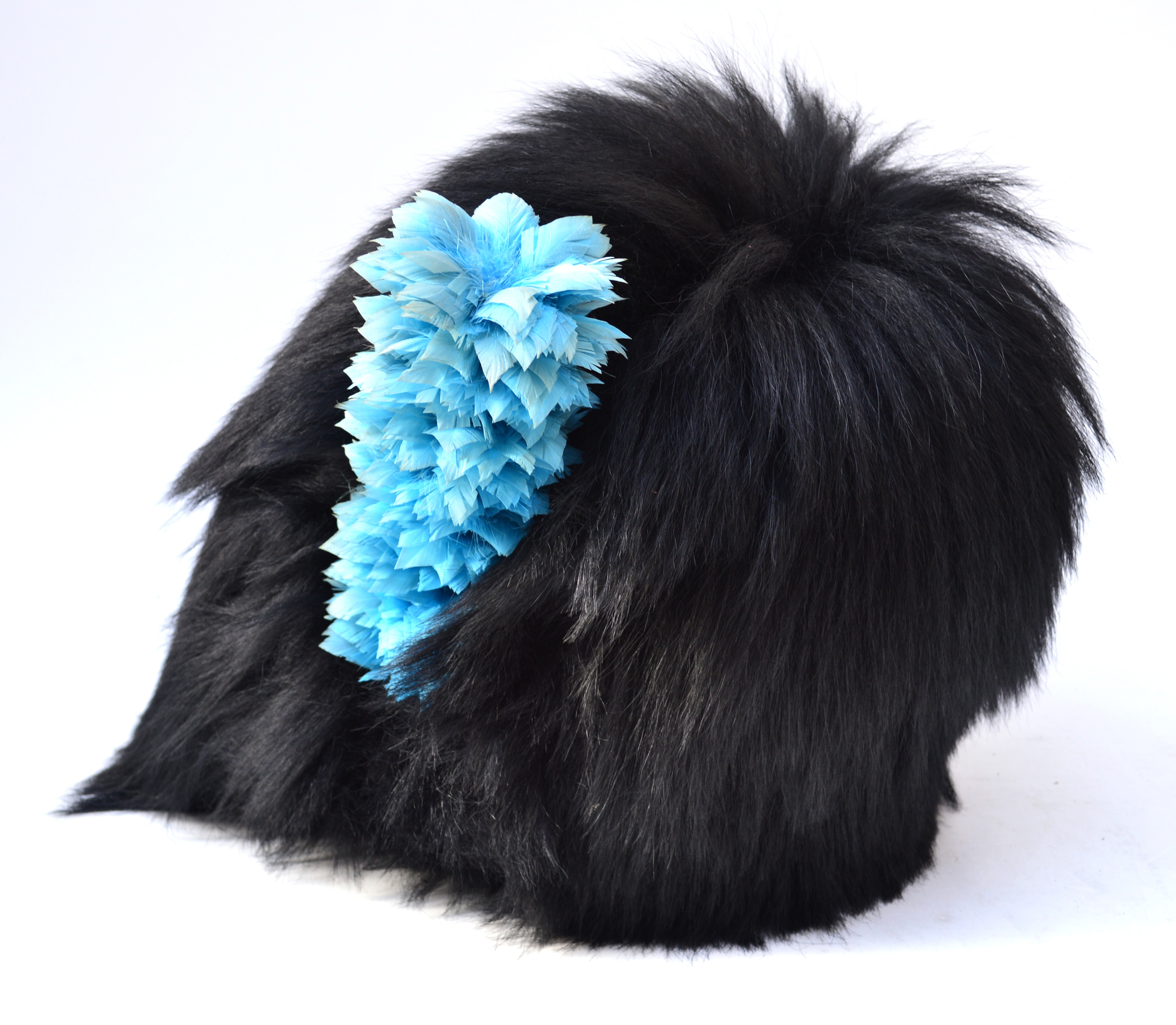 An Irish Guards officer's bearskin, complete with feather plume and brass chin chain.