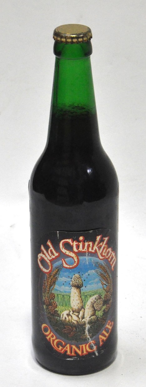 A bottle of old Stinkhorn organic ale bearing label signed by Paul McCartney dated 16.2.97. *