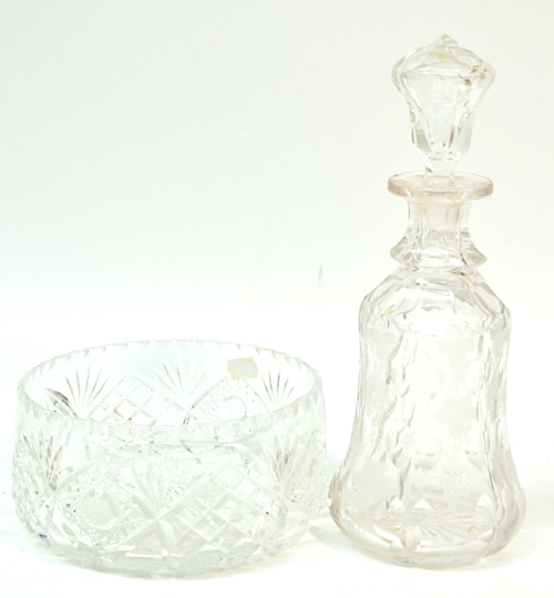A cut glass decanter with engraved decoration and stopper, also a cut glass bowl (2).