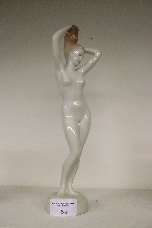 A Budapest Aquincum Porcelain Nude Woman Figurine, mid 1900`s, approx 26cm tall.