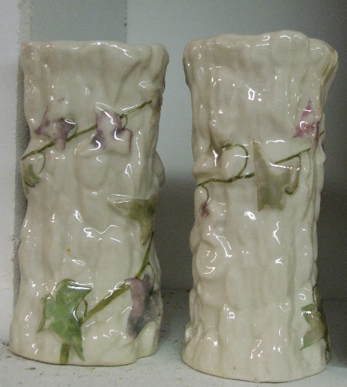 A Rare Pair of Belleek Second Period (1891-1926) Vases, modelled as tree stumps with spiral bands of