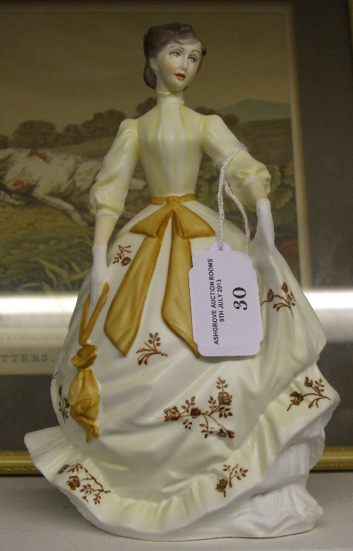 A Royal Worcester Figure, `Charity`, initialled J. Mc to base, approx 19.5cm high.