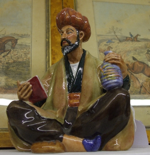 A Royal Doulton Figure, `Omar Khayyam`, HN 2247, designed by M. Nicoll, marked with initials `J.