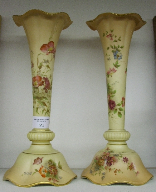 A Pair of Royal Worcester Porcelain Vases of trumpet shaped form on spreading foot, with printed and