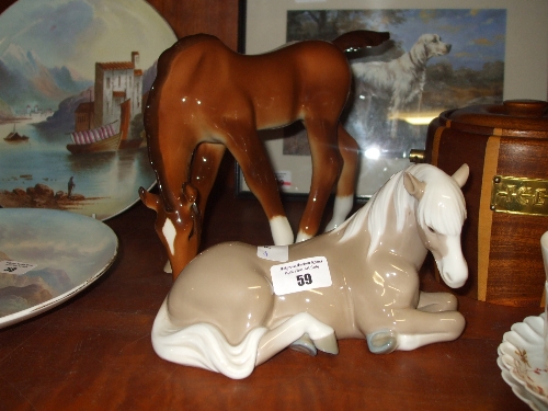 Two Ceramic Figures of Horses.