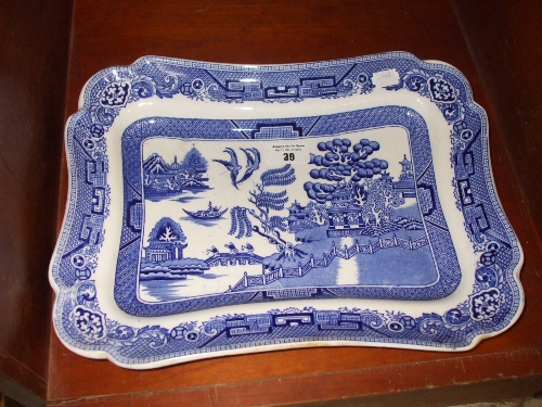 A Staffordshire Blue and White Willow Pattern Shaped Serving Dish.