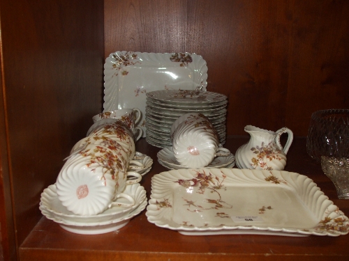 A Late 19th/Early 20th Century Halivand & Limoges Porcelain Tea Service, with retailers stamp for