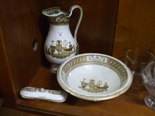 A Victorian Pottery Wash Basin, Jug and Toothbrush Holder, all having brown transfer printed