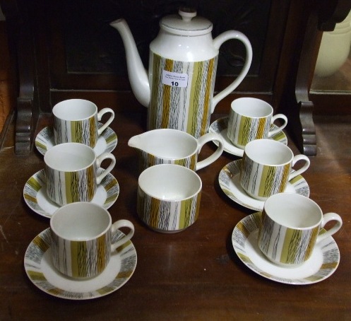 A Retro Midwinter `Sienna` Pattern Six Setting Coffee Service with coffee pot, cream and sugar.