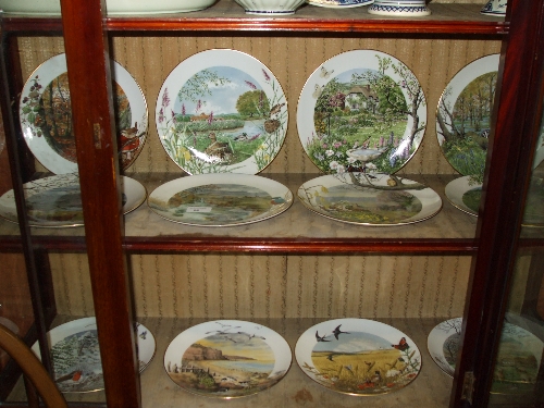 Twelve Royal Worcester `Seasons` Collector`s Plates.