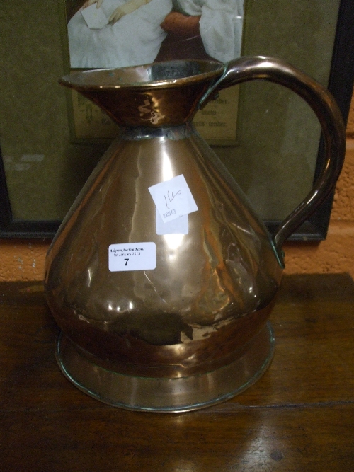 A 19th Century Copper Jug with Lead Seal.