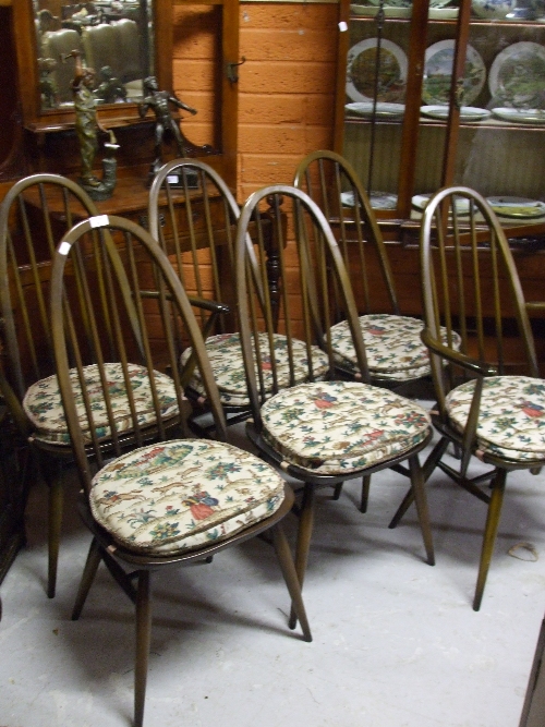 A Set of Six Ercol Dining Chairs, to include two carvers.