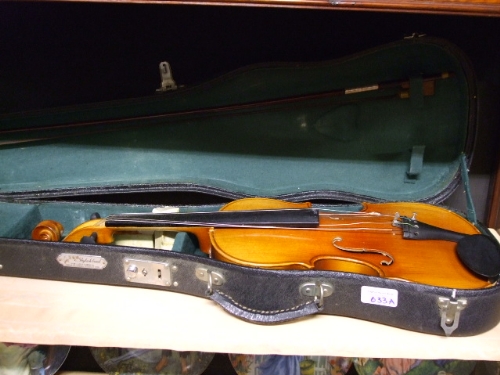 A Chinese Violin and Bow, in case.