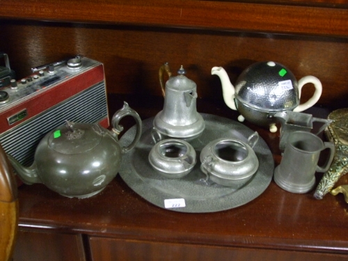 A Quantity of Pewter Wares including a three piece coffee set, circular tray, a `Stay-Hot-Tea-Pot`