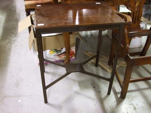 A Rectangular Mahogany Occasional Table, the supports joined by `X` frame stretcher rails.